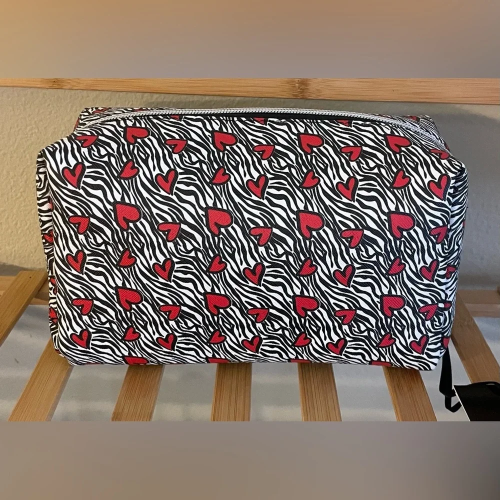 NEW…Bebe Zebra Print with Hearts Cosmetic Bag